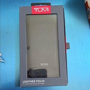Tumi Leather Folio case designed for the Samsung Galaxy S6 edge+. Unused.